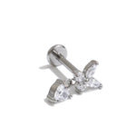 Gold butterfly charm stud earring displayed on The Seventh Edit branded pouch 