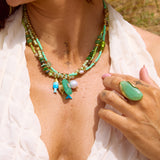 Handcrafted multi-strand beaded necklace in green and turquoise tones, featuring malachite, jade and seed beads with gold accents Uk jewellery 