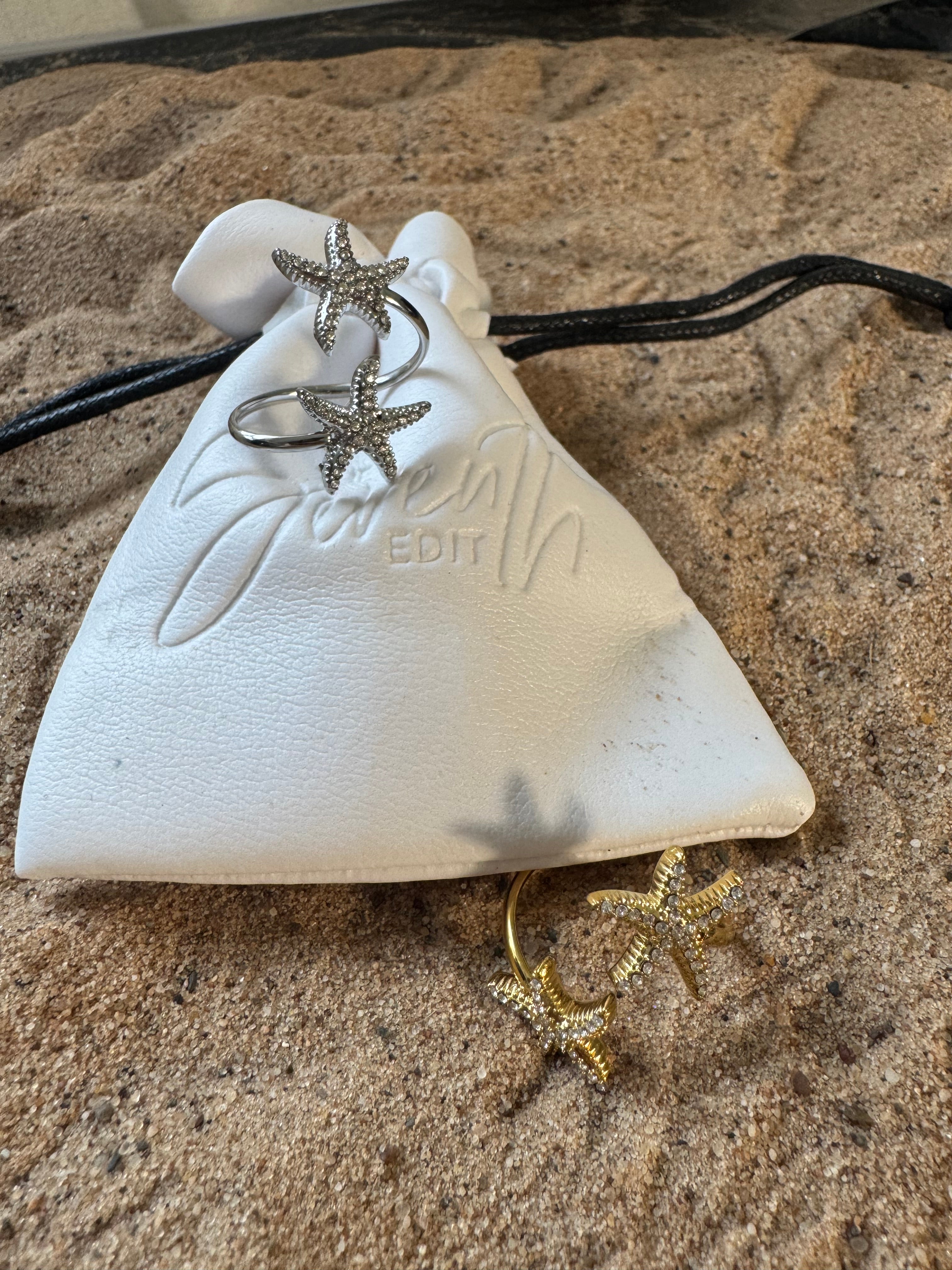 Gold double starfish adjustable ring with pave crystal detail. Uk jewellery 